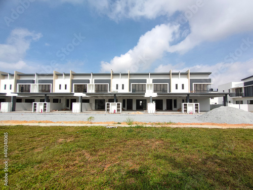 SEREMBAN, MALAYSIA -JUNE 17, 2021: New double-story terrace house under construction in Malaysia. Designed by an architect with a modern and contemporary style. Almost completed. 