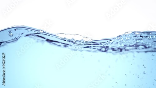 Super Slow Motion Shot of Clear Waving Water With Bubbles Background at 1000 fps. photo