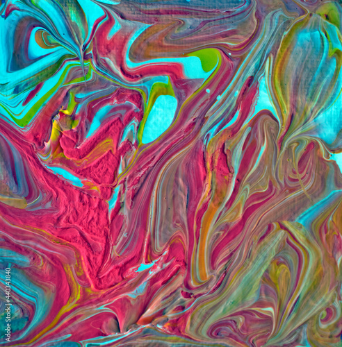 an abstract design of swirls in coral  yellow and whie