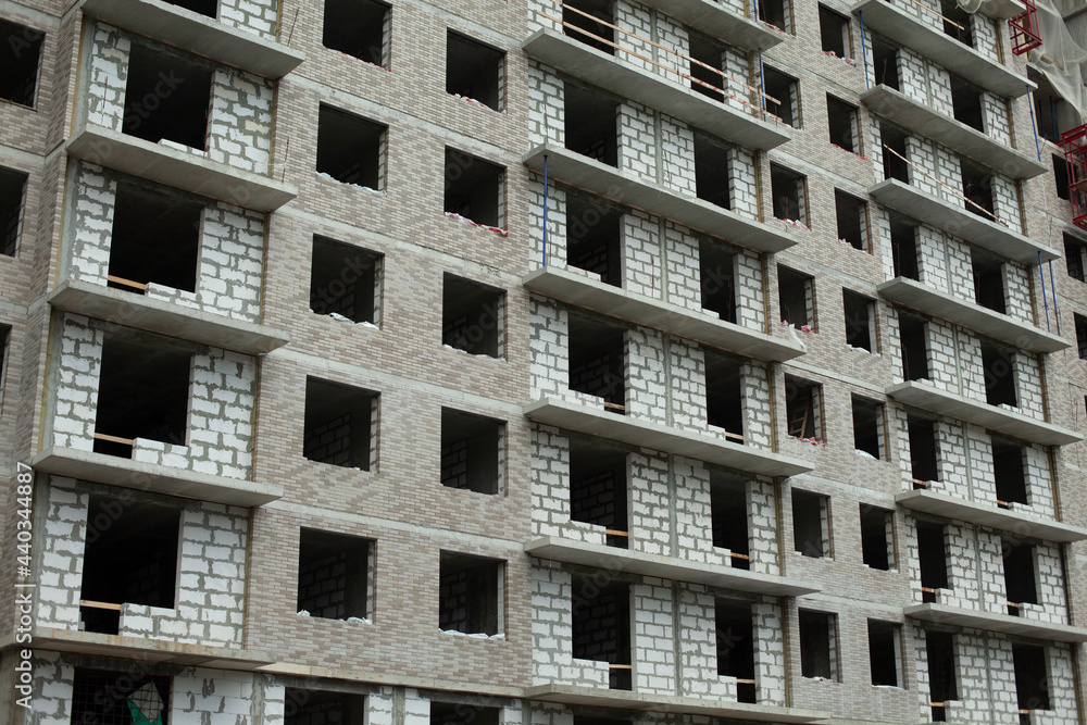 Construction of a multi-storey building. Construction of a multi-storey building.