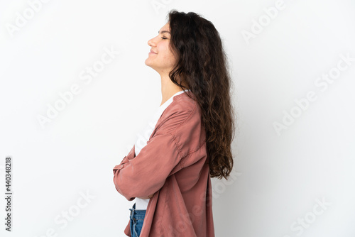 Teenager Russian girl isolated on white background in lateral position