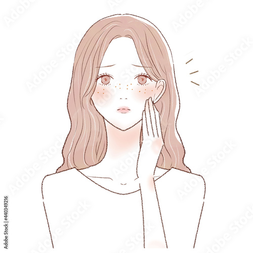 そばかすを気にする女性