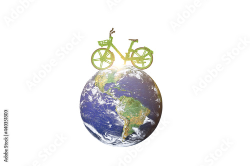 Green ecological bicycle on globe isolated on white background. Environmentally friendly concept. image furnished by NASA