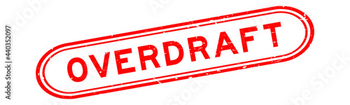 Grunge red overdraft word rubber seal stamp on white background