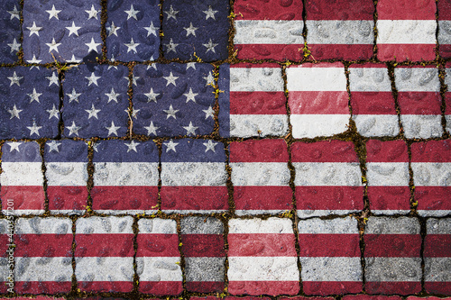 National flag of USA on stone wall background. Flag banner on stone texture background.