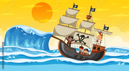 Ocean with Pirate ship at sunset scene in cartoon style photo