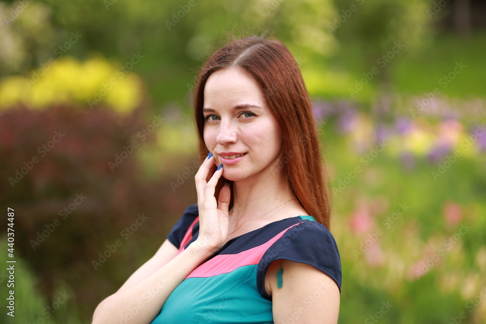 Portrait of young woman in the park Portrait of young woman in the park