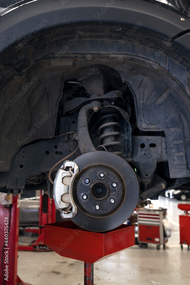 disc brake of the vehicle for repair. car repairing in garage disc brake of the vehicle for repair. car repairing in garage