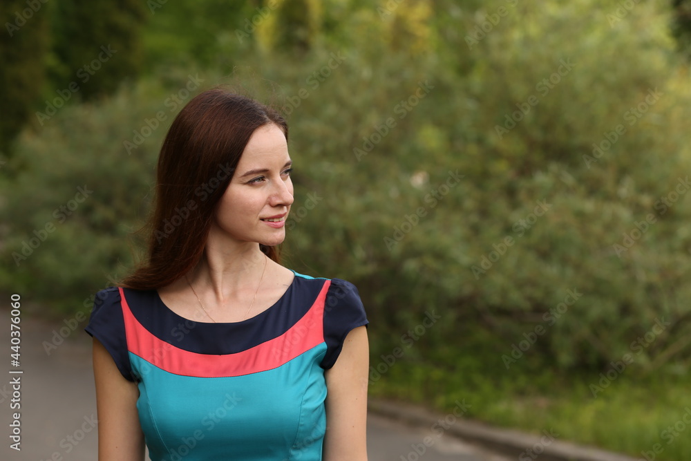 Young woman walking in the street