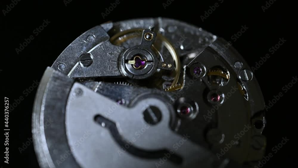 watch movement on black background watch movement on black background