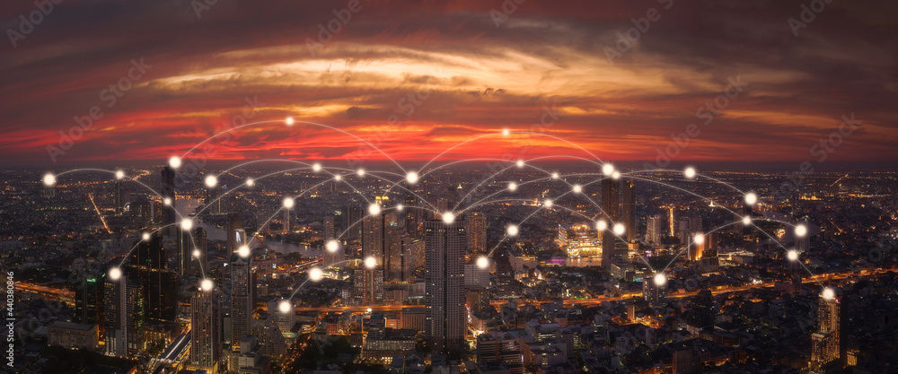 Wireless communication network in Big city concept. Social media connection by wireless telecommunication technology with cityscape background.