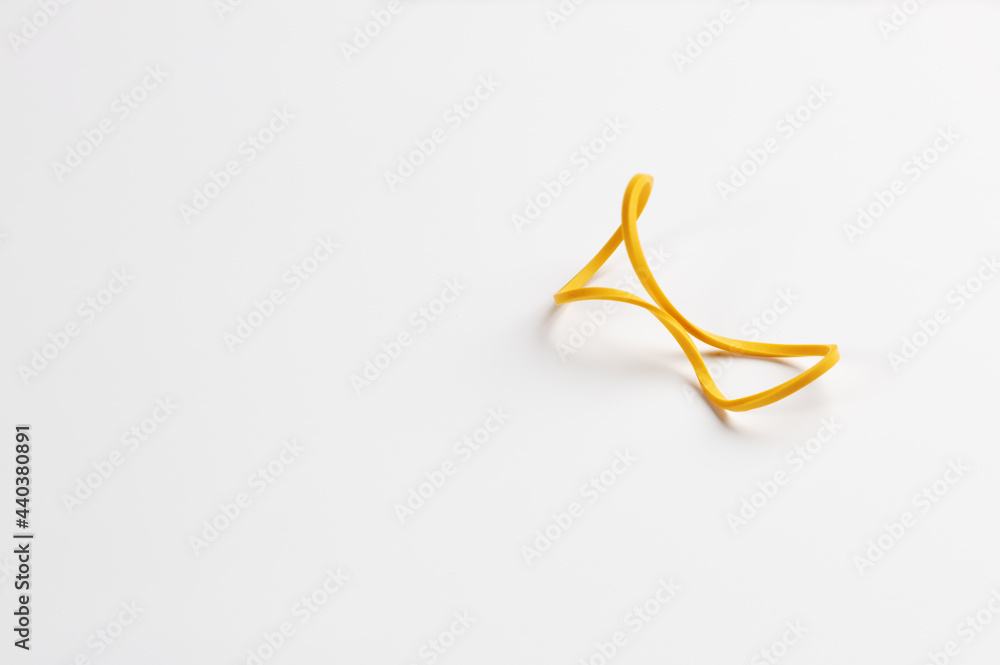Folded rubber band isolated on white background with copy space Folded rubber band isolated on white background with copy space