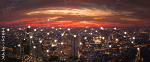 Wireless communication network in Big city concept. Social media connection by wireless telecommunication technology with cityscape background.
