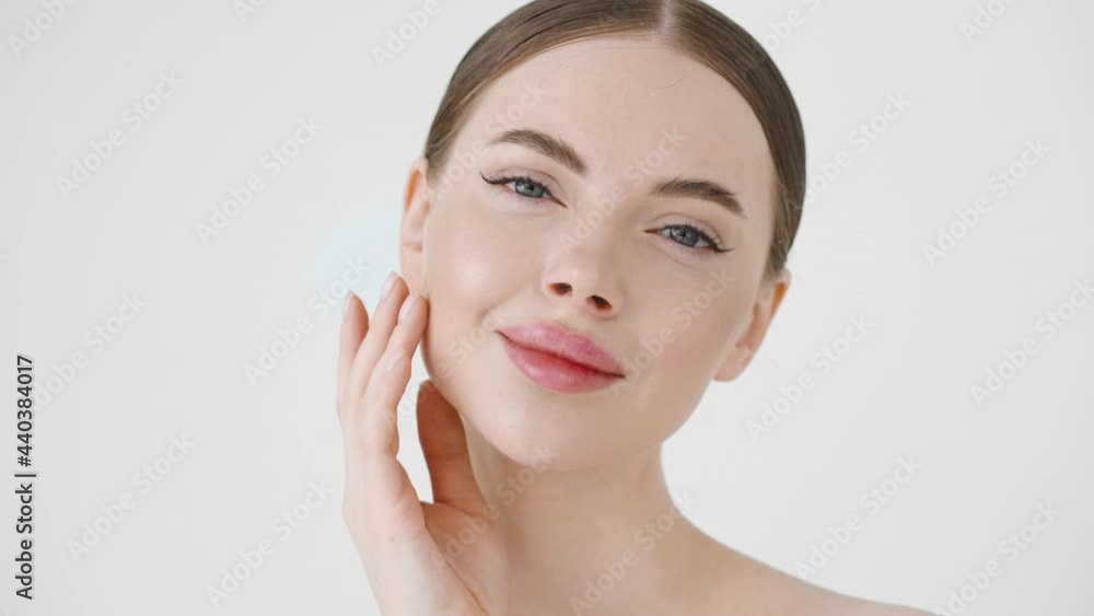 Beautiful woman face healthy skin clean natural make up female beauty cosmetic concept healthy teeth smile Beautiful woman face healthy skin clean natural make up female beauty cosmetic concept healthy teeth smile