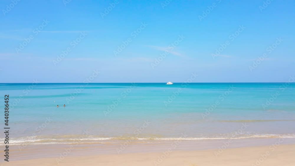 4K. 4096x2304p Aerial view Drone shot. Phuket beach sea sand and sky. Landscape view of beach sea in summer day. Beach space area. At Karon Beach, Phuket, Thailand. On 15 June 2021. 4K UHD. Video Clip 4K. 4096x2304p Aerial view Drone shot. Phuket beach sea sand and sky. Landscape view of beach sea in summer day. Beach space area. At Karon Beach, Phuket, Thailand. On 15 June 2021. 4K UHD. Video Clip