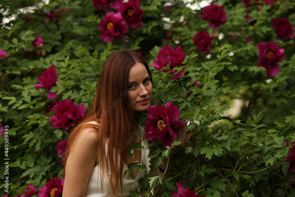 portrait of a young woman with purple flowers portrait of a young woman with purple flowers