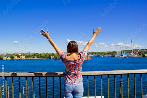 Canvas Print beautiful woman looking to view of stockholm in Sweden