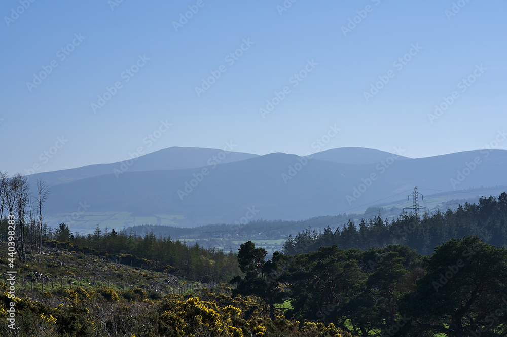 Fototapeta premium Beautiful bright view of Wicklow Mountains seen from Ballycorus lead mining tower on sunny day Ballycorus, Co. Dublin, Ireland. High resolution