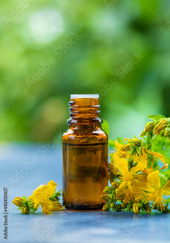 An essential oil extract of St. John's wort herb. Selective focus.