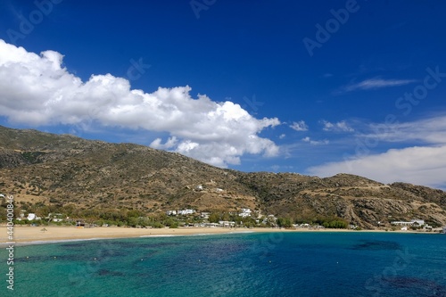 View of the amazing sandy and turquoise beach of Mylopotas on the island of Ios in Greece photo