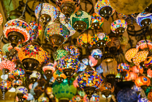 traditional handmade turkish lamps in souvenir shop. Mosaic of colored glass.