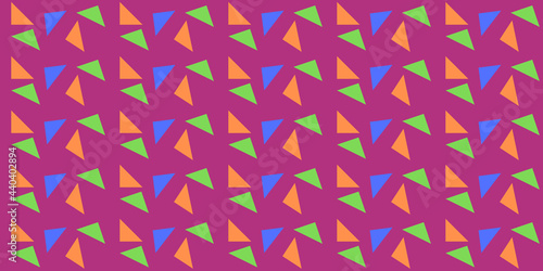 Pattern with triangles of different colors on a dark background.