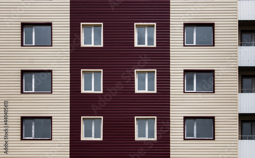 Facade of multistory apartment house. Urban landscape. Block of flats.