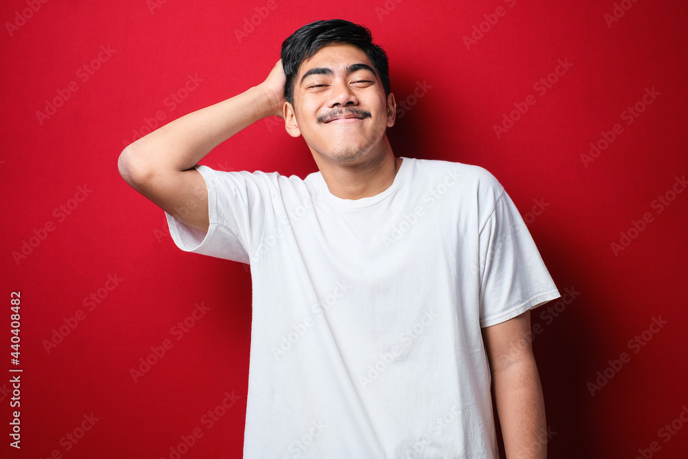 Young handsome man with mustache wearing white t-shirt standing over red background confuse and wonder about question Young handsome man with mustache wearing white t-shirt standing over red background confuse and wonder about question