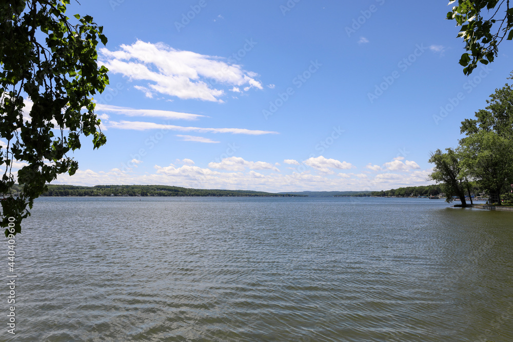 Conesus Lake view from the north end of the lake. Sunny summer morning on the Finger Lake.