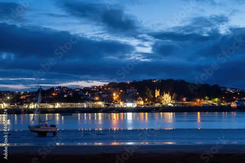 Appledore village by night with lights, as seen from Instow, North Devon, England, UK. © Mushy