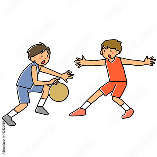 バスケットボールをする少年