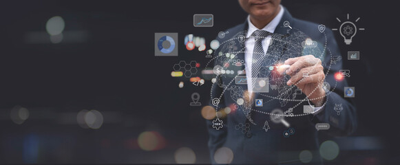 Digital marketing, Global business, IoT Internet of Things, business strategy concept. Businessman touching on global network with technology icons