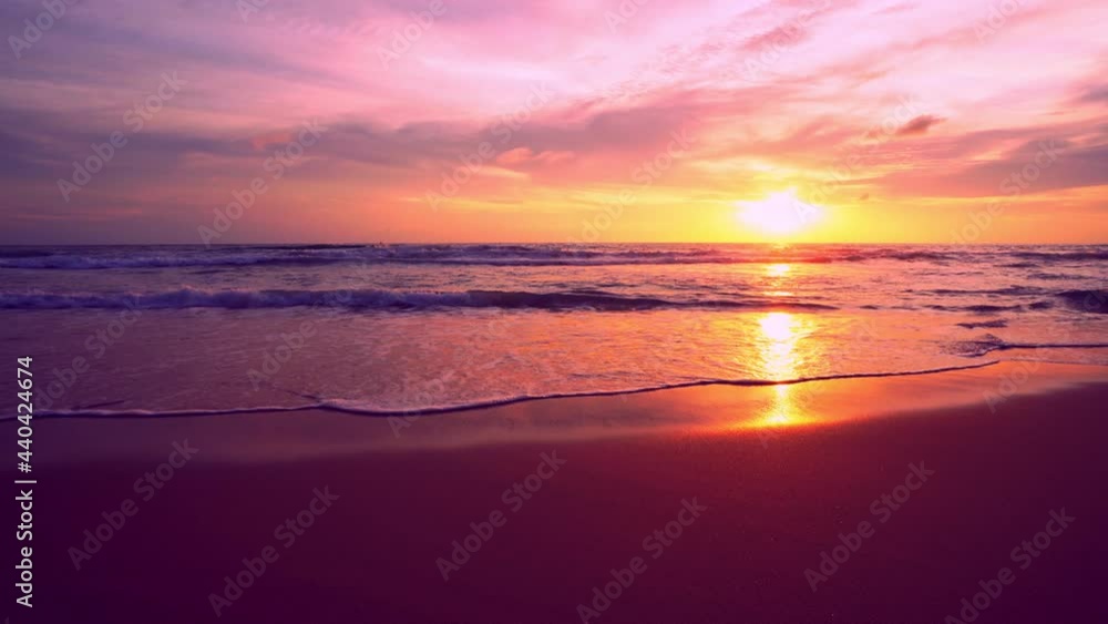Dramatic light sea sunrise or sunset over sea Burning twilight sky and shining golden Waves crashing on sandy shore Beautiful seascape nature background Dramatic light sea sunrise or sunset over sea Burning twilight sky and shining golden Waves crashing on sandy shore Beautiful seascape nature background
