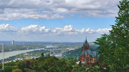 Beautiful cityscape with the castle of Drachenburg on a blue sky background in Germany photo