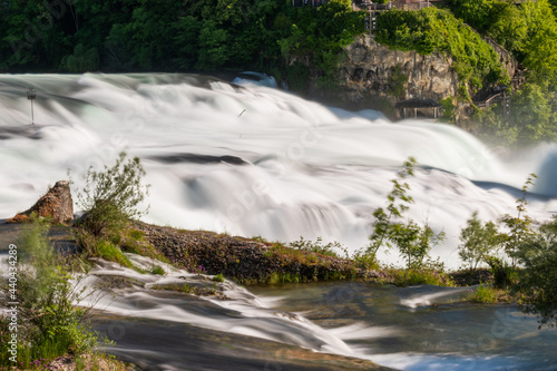 Fototapeta Naklejka Na Ścianę i Meble -  Splashing water at the incredible rhine falls in Switzerland 28.5.2021