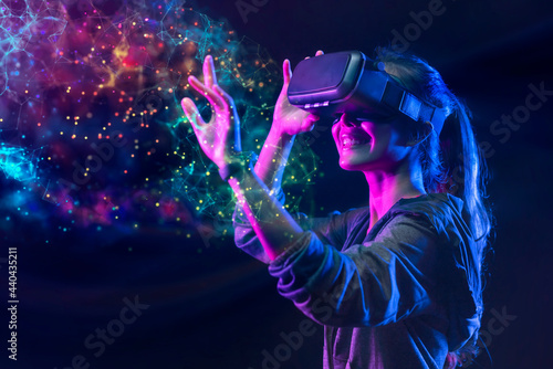 People with VR grasses playing virtual reality game. Future digital technology and 3D virtual reality simulation modern futuristic lifestyle photo