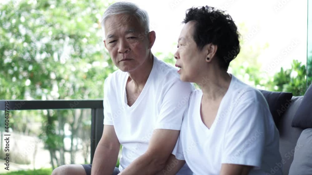 Asian senior couple consoling discuss problem each other Asian senior couple consoling discuss problem each other