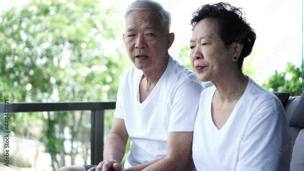 Asian senior couple consoling discuss problem to each other Asian senior couple consoling discuss problem to each other