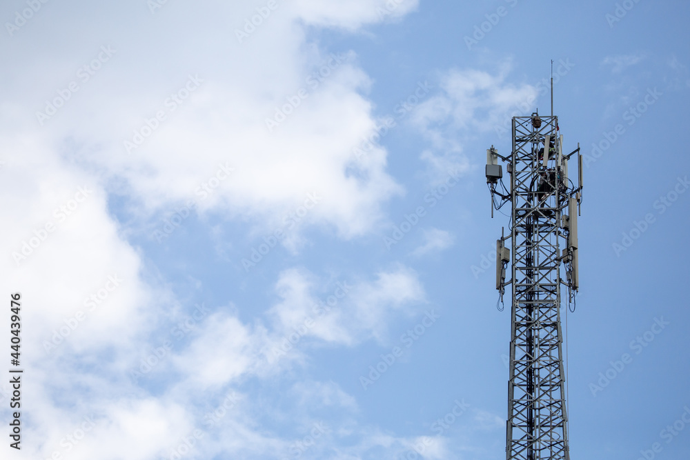 transmitter atop a cell phone pole About to be upgraded from 4g to 5g. High-risk electrical engineer job in Thailand.