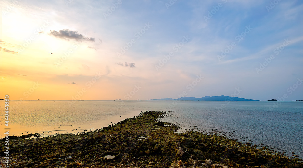 rocky coast of the sea,sunset view at bangRak beach ,koh samui ,suratthani ,thailand 