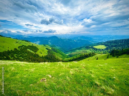 Epic landscape with hills and mountains on a peaceful day in Romania