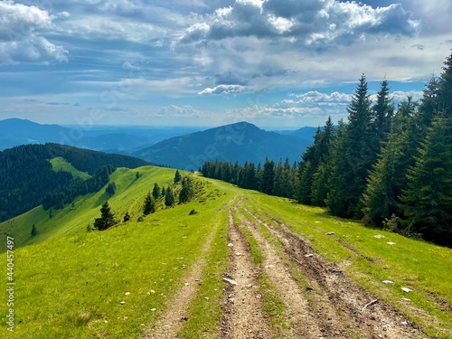 Epic road on an alpine region in the mountains, perfect place for travelling and exploring the nature