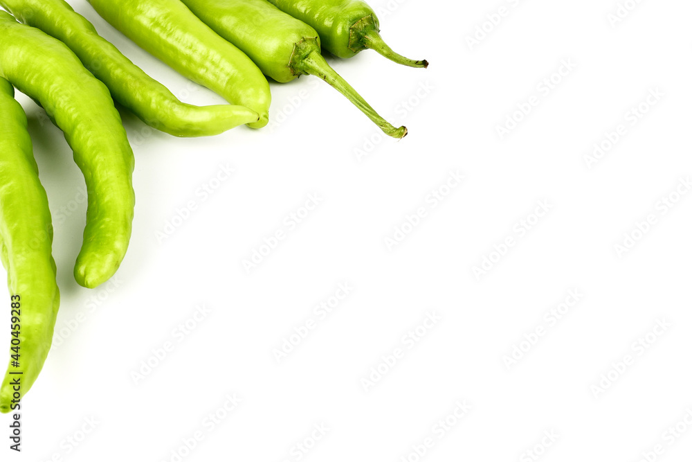 fresh green banana peppers or sweet peppers (capsicum annuum) isolated on a white background fresh green banana peppers or sweet peppers (capsicum annuum) isolated on a white background