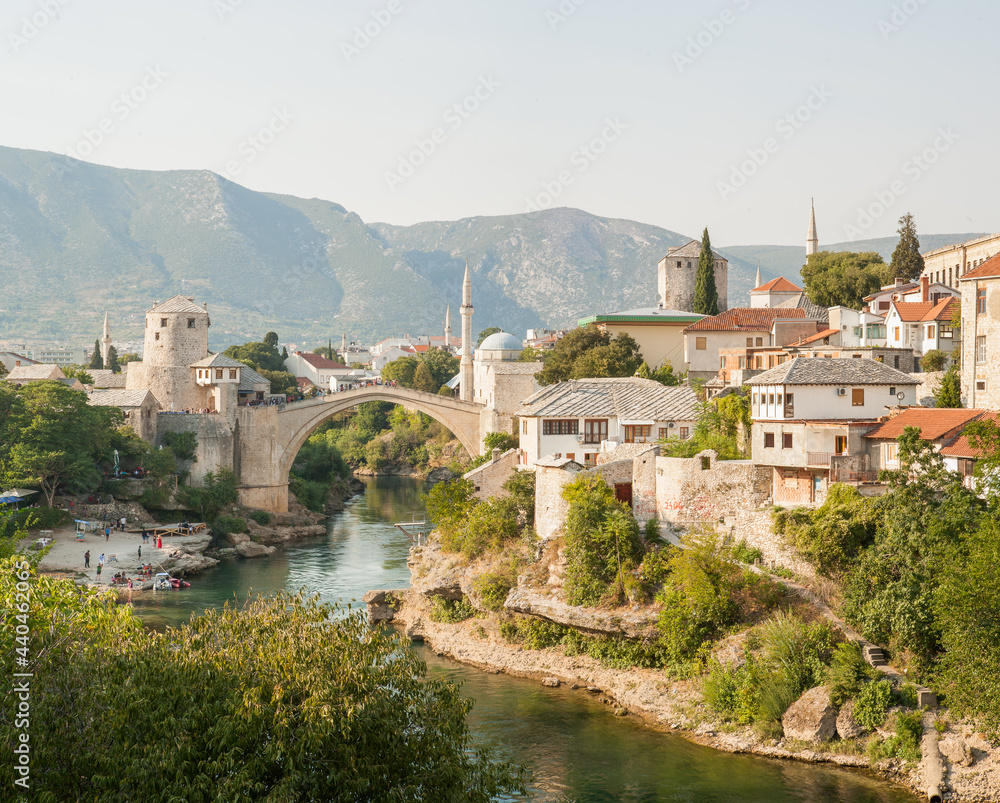 Old town of Mostar, Bosnia and Herzegovina. Old bridge above beautiful emerald river Neretva
