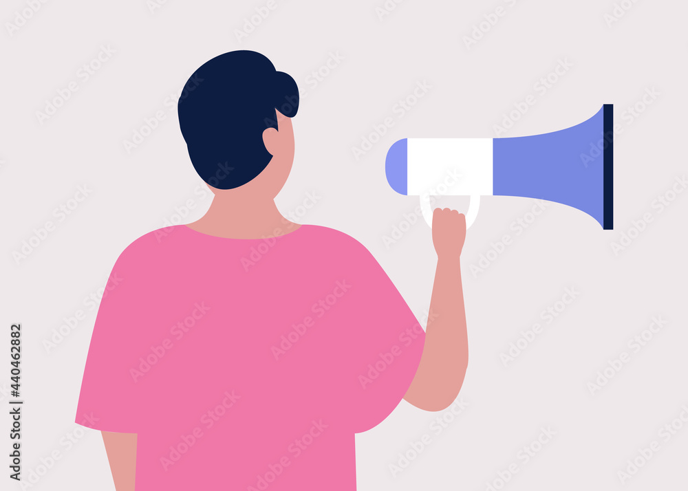 Young man speaks into a megaphone Young man speaks into a megaphone