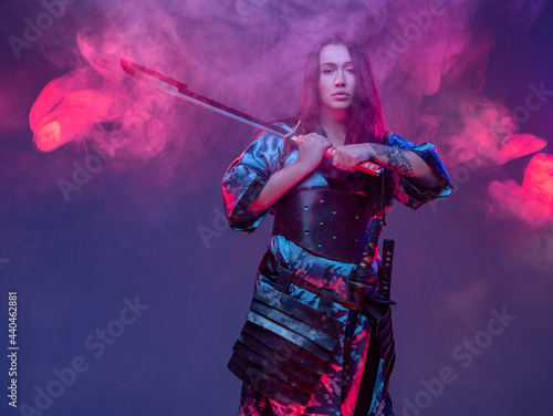 Tattooed cyberpunk woman samurai with steel sword
