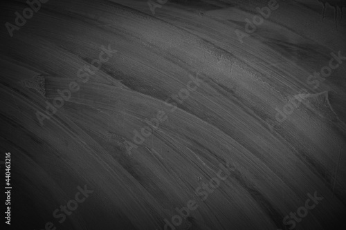 Black and white image of black material texture pattern as a background in your project