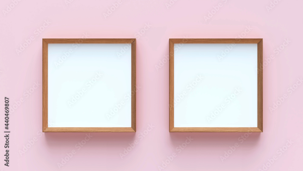Two square shape wooden frames in pink background Two square shape wooden frames in pink background