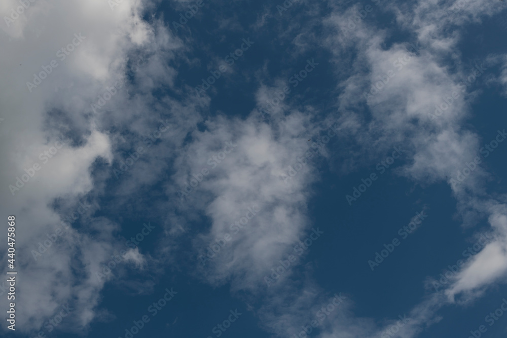 Clouds in the sky drifting away in a light breeze Clouds in the sky drifting away in a light breeze