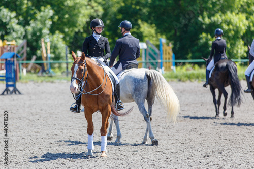 Group of horse riders waiting for dressage test © skumer